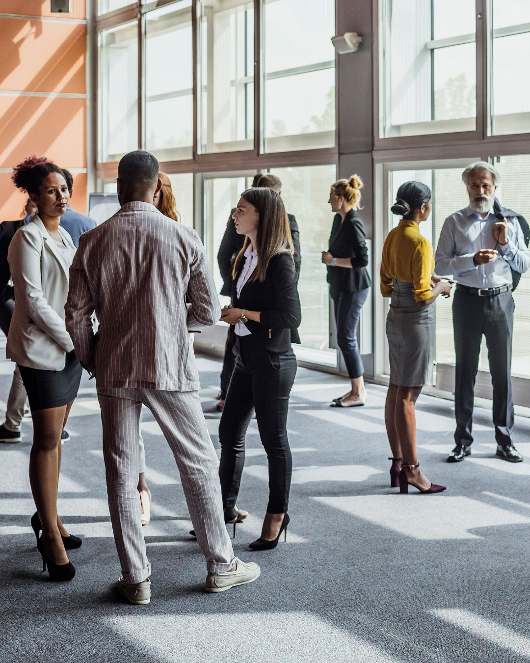 Professionals networking during a break at social media events Oregon 2025.